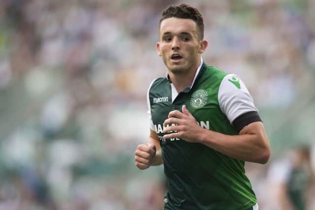 John McGinn in action for Hibs. Neil Lennon reckons Aston Villa are in pole position to sign the midfielder. Picture: SNS Group