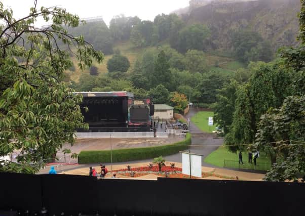 A view from a number 19 bus over a controversial barrer put up around Princes Street Gardens (Picture: Andrew O'Brien)