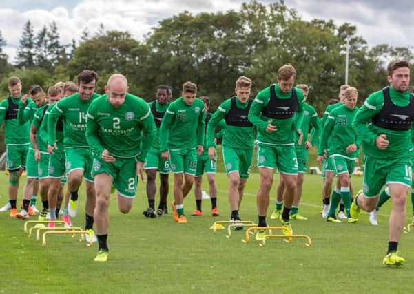 Hibs are put through their paces at East Mains ahead of facing Molde. Picture: SNS Group