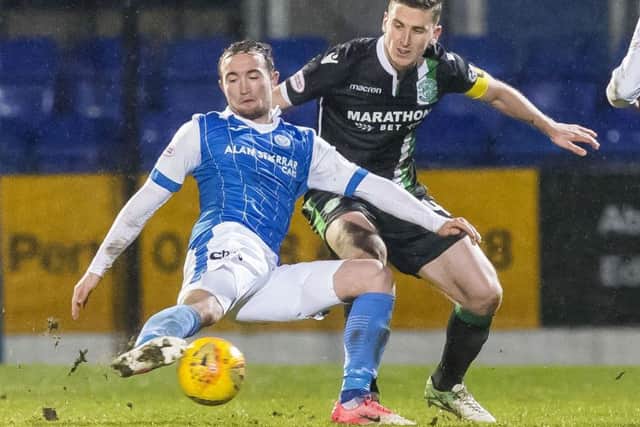 Paul Hanlon and Chris Kane compete for the ball during the last encounter between the sides at McDiarmid Park. Picture: SNS Group