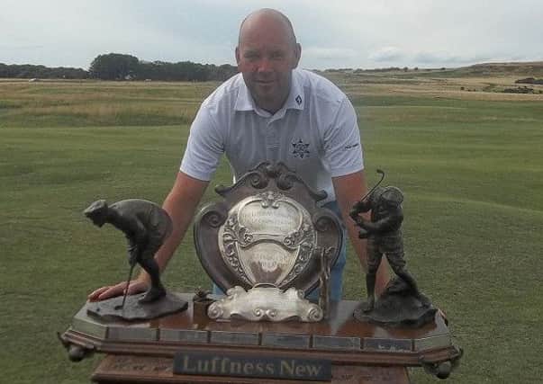 Glencorse member Jamie Morris shows off his impressive silverware after victory at Luffness New