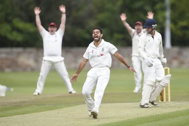 Aman Bailwal from Watsonians celebrates a LBW against Heriot's. Pic: Greg Macvean