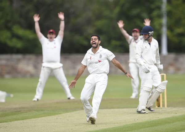 Aman Bailwal from Watsonians celebrates a LBW against Heriot's. Pic: Greg Macvean