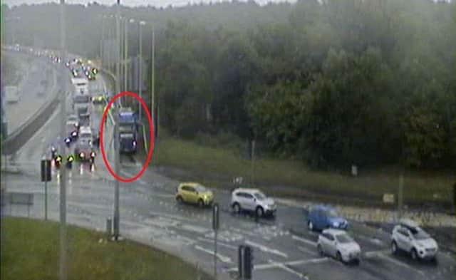 The broken down lorry is blocking one lane near the Sheriffhall Roundabout. Picture: Traffic Scotland