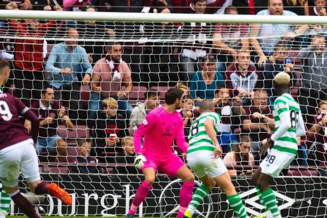 Kyle Lafferty nets the winner against Celtic.