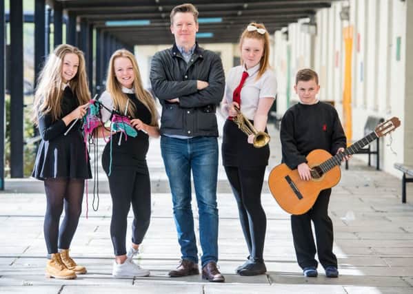 Castlebrae pupils with Festival director Fergus 
Linehan in 2016. The link-up between the Festival and the school should be a model for the future. Picture: Ian Georgeson