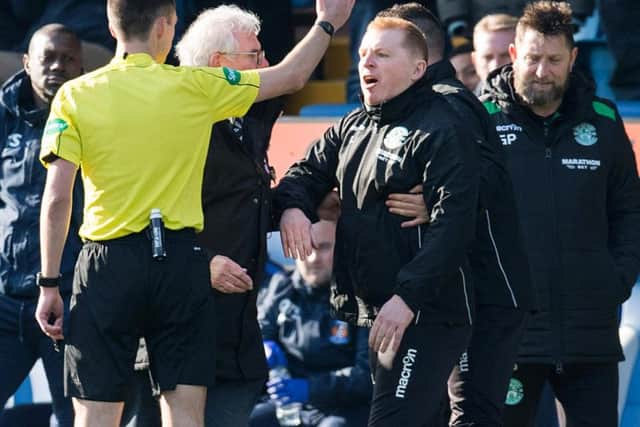 Referee Kevin Clancy sends Hibs boss Neil Lennon to the stand at Rugby Park