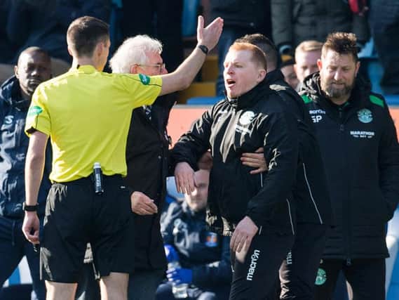 Referee Kevin Clancy sends Hibs boss Neil Lennon to the stand at Rugby Park