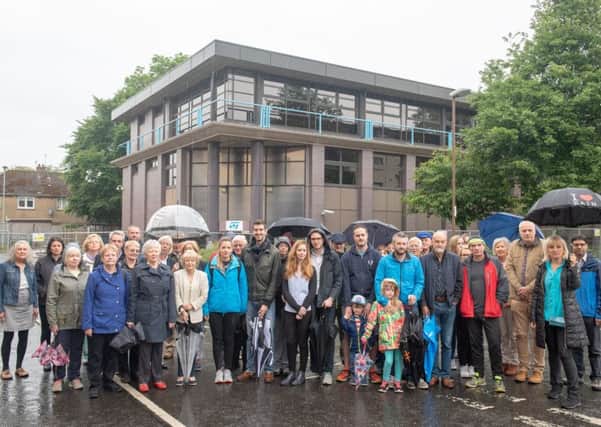 Residents of 
Pinkhill gather to protest the Corstorphine development.