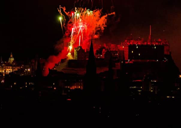 The end of the Edinburgh International Festival with over 4 tonnes of explosives and 400,000 fireworks choreographed to live orchestral music light up the sky against the iconic backdrop of Edinburgh Castle