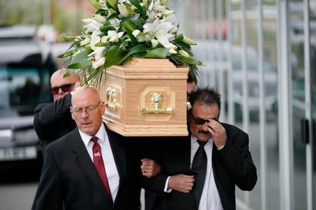 Paul Chuckle (R) carries the coffin of his brother Barry Chuckle during his funeral service at The New York Stadium in Rotherham. Picture: Getty Images