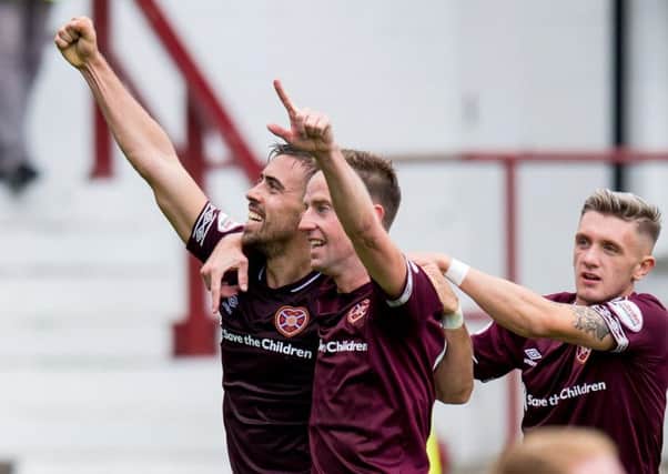 Olly Lee , left, scored at Dunfermline to put Hearts into the last eight