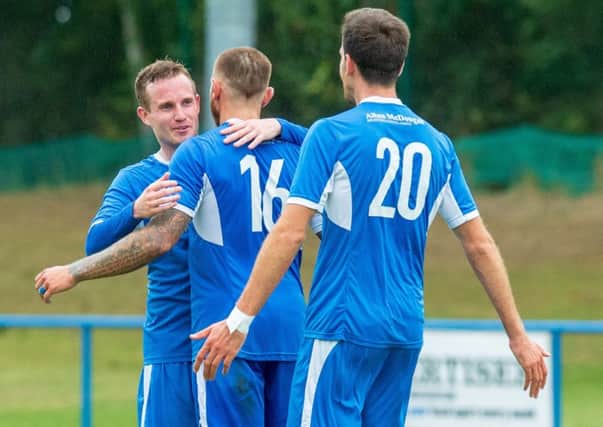 Newtongrange celebrate their fourth goal, scored by Ali Forster (No.16). Pic: Ian Georgeson
