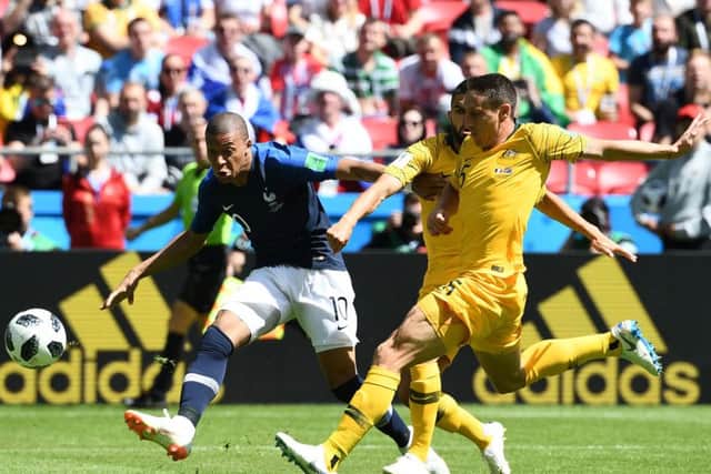 Mark Milligan faced France forward Kylian Mbappe during this summer's World Cup