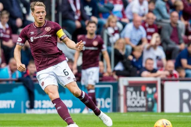 Christophe Berra was injured during Hearts' win over Celtic. Picture: SNS Group