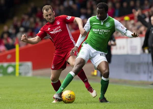Niall McGinn and Efe Ambrose will meet twice in a month on league and Betfred Cup duty as Aberdeen face two trips to the capital. Picture: SNS Group