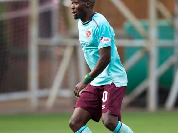 Arnaud Djoum is back in action for Hearts after six months out