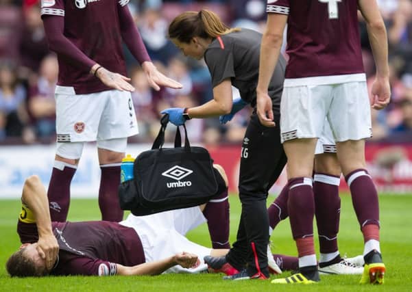 Hearts are without captain Christophe Berra for six months. Picture: SNS/Ross Parker