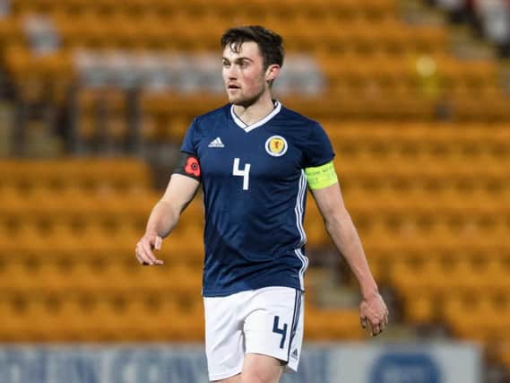 Hearts defender John Souttar has been promoted to the full Scotland squad.