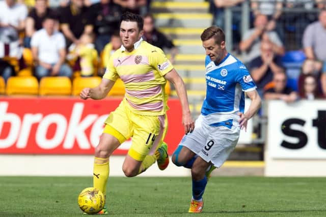 Hearts' John Souttar in action against Steven MacLean, then at St Johnstone. Picture: SNS
