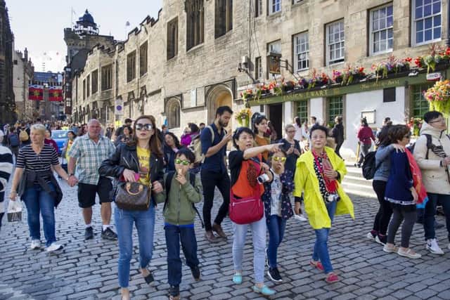 While Edinburgh welcomes tourists, there are increasing concerns over holiday lets. Picture: Ian Rutherford