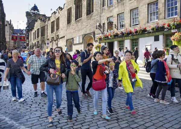 While Edinburgh welcomes tourists, there are increasing concerns over holiday lets. Picture: Ian Rutherford