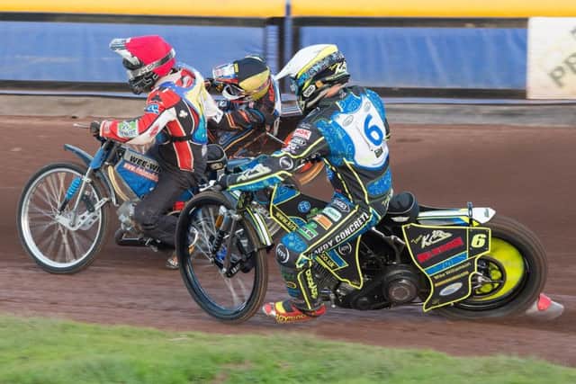 Heat  2: William Lawson forces through the gap between Kyle Bickley and Rene Bach