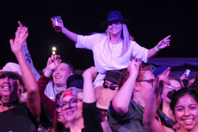 Fans enjoying themselves at Midstock Festival on Friday 31st August at Dalkeith Country Park. Photo by Kevin Murray.
