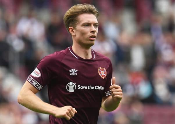 Craig Wighton scored two goals and set up another as Hearts thumped United