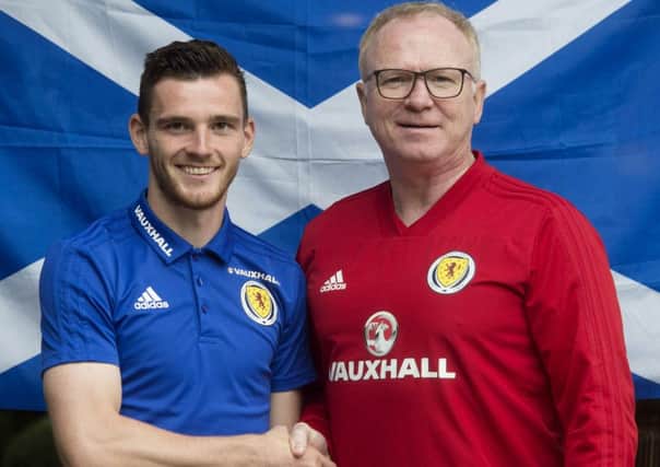 Scotland manager Alex McLeish is pictured with Andy Robertson as he is named as the new captain of Scotland