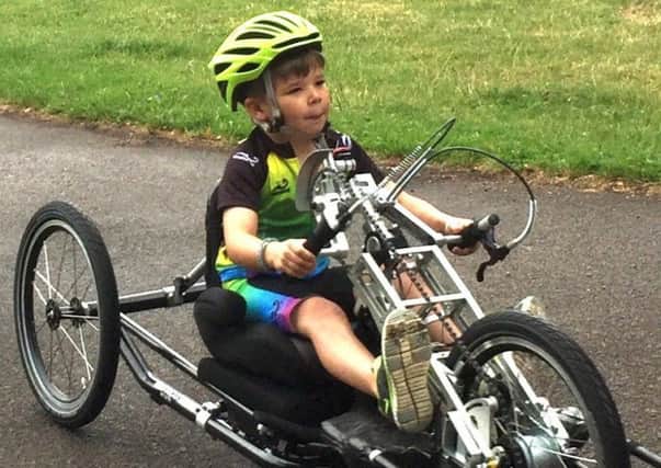 Jack used a handcycle to get around after his surgery