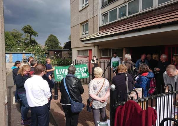 The protest in Muirhouse was put together by tenant union Living Rent, there were angry scenes outside Fidra Court. Picture: Contributed