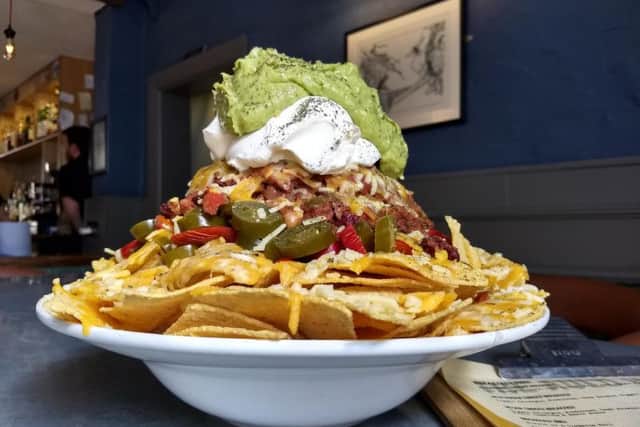 The "gigantic" nachos are served at the Auld Hoose in the city's Southside. Picture: Jonathan Winks