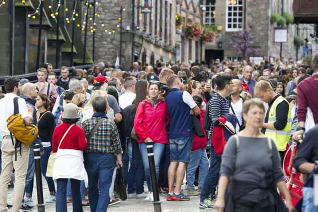 The pair preyed on unwitting tourists on the Royal Mile. Picture: Ian Rutherford
