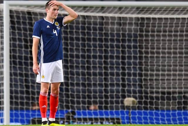 Hearts defender John Souttar made his debut on a tough night for Scotland