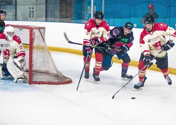 Racers with the puck. Picture: Ian Coyle