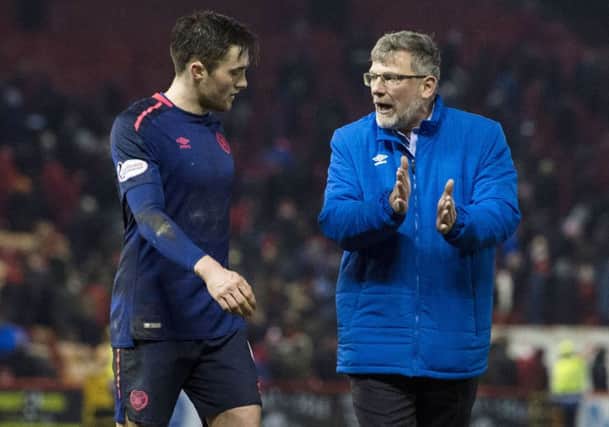30/12/17 LADBROKES PREMIERSHIP
 ABERDEEN v HEARTS (0-0) 
 PITTODRIE - ABERDEEN 
 Hearts' John Souttar with Craig Levein (right) at full time