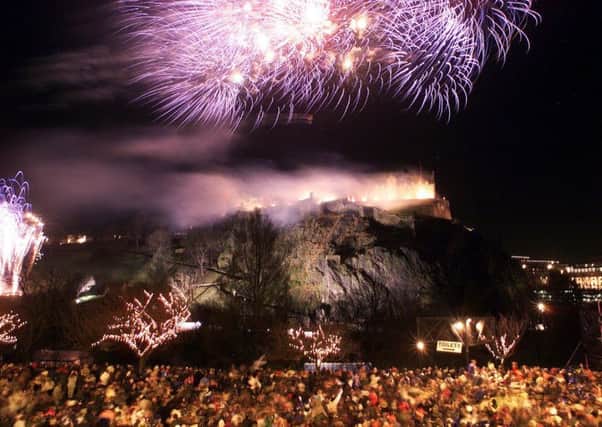 Fireworks explode over Edinburgh Castle for Hogmanay celebrations