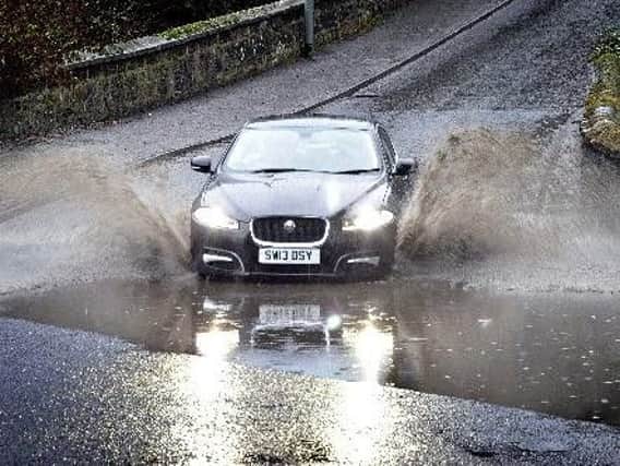 Wet road conditions in Midlothian. Picture: Malcolm Irving