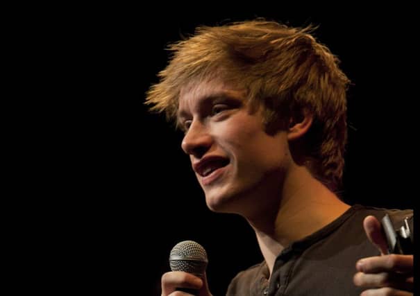 Daniel Sloss on stage in 2013