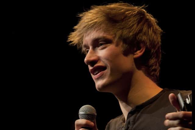 Daniel Sloss on stage in 2013