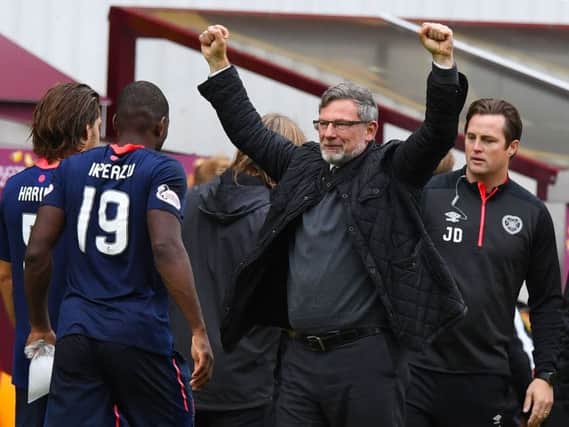 Hearts manager Craig Levein celebrates at the end of today's match. Picture: SNS