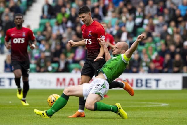 Hibernian's David Gray (right) tackles Kilmarnock's Jordan Jones. Picture: SNS