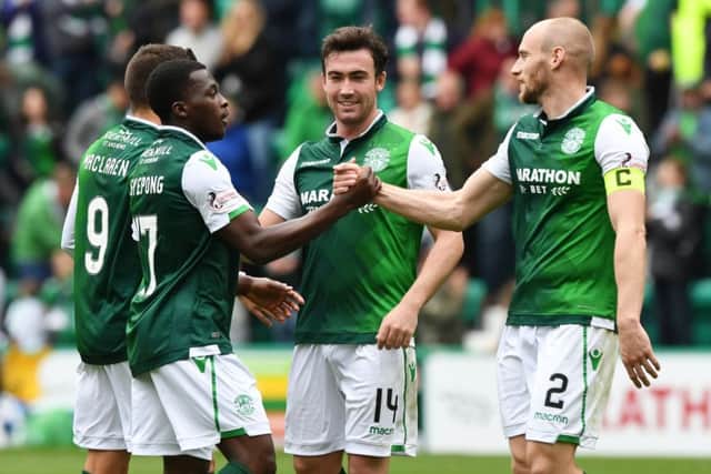 Thomas Agyepong, left, with David Gray and Stevie Mallan at full time