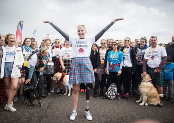 17-year-old Joanna Lamb, who lives with Osteosarcoma, a rare bone cancer that only affects around 20 people each year in Scotland. The Edinburgh teen, who suffered a leg amputation due to her illness earlier this year, walked the Wee Wander for cancer charity