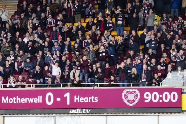 Hearts fans packed out the away section at Fir Park and were rewarded with a 1-0 win over Motherwell. Pic: SNS