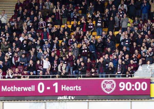 Hearts fans packed out the away section at Fir Park and were rewarded with a 1-0 win over Motherwell. Pic: SNS