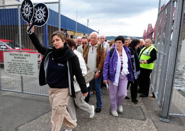 Passengers come ashore at Hawes Pier after disembarking MSC Magnifica Cruise Liner. Picture: TSPL