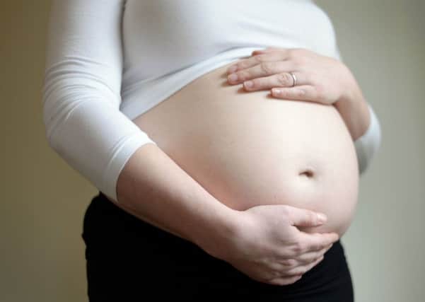 A pregnant woman. Picture: Andrew Matthews/PA Wire