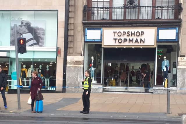 A police cordon has been set up outside Topshop on Princes Street